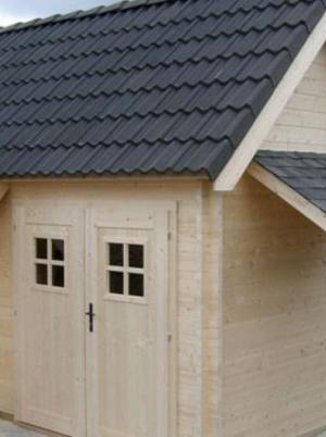 Houten cottage met afdak